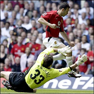 Ryan Giggs fails to connect with a long ball as Manchester United go on the attack from the off
