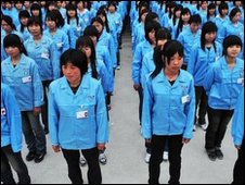 Chinese workers in Shenzhen queue up to enter factory