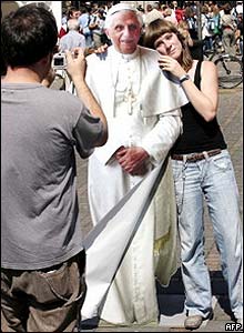 Woman poses with cardboard Pope