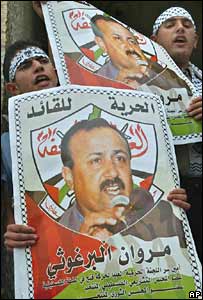 Students hold posters of Marwan Barghouti in the West Bank town of Nablus