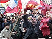 Protesters burn and tear European flags in Tehran
