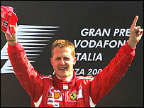 Michael Schumacher on the Italian Grand Prix podium after announcing his retirement