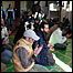 Danish Muslims kneeling in mosque