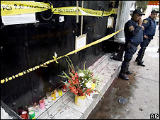 Flowers and candles left outside Mexico City nightclub where stampede happened - 24/6/2008