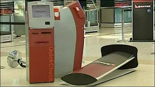 Interior of airport, equipment fallen over