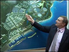Sochi's mayor, Anatoly Pakhomov,  shows the layout of the Olympic park