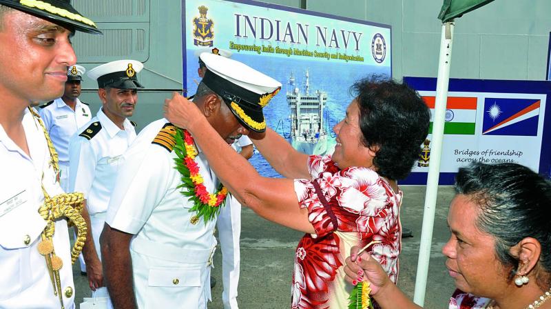 Commanding Officer of INS Satpura, Captain A.N. Pramod and his staff are being welcomed at Port Majuro, Marshall Islands, off Hawaiian Coast on Saturday. The ship is en route to India after participation in RIMPAC-16.