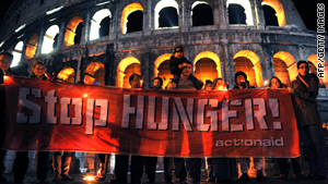 Anti-hunger campaigners demonstrate at the Colosseum in Rome on Sunday ahead of the world food security summit.