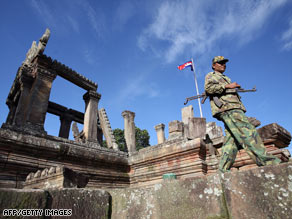 A Cambodian soldier walks past Preah Vihear temple in the Cambodian province of Preah Vihear.