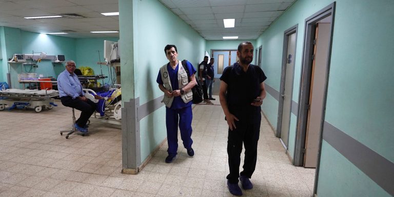 Medical personnel inside a hospital.