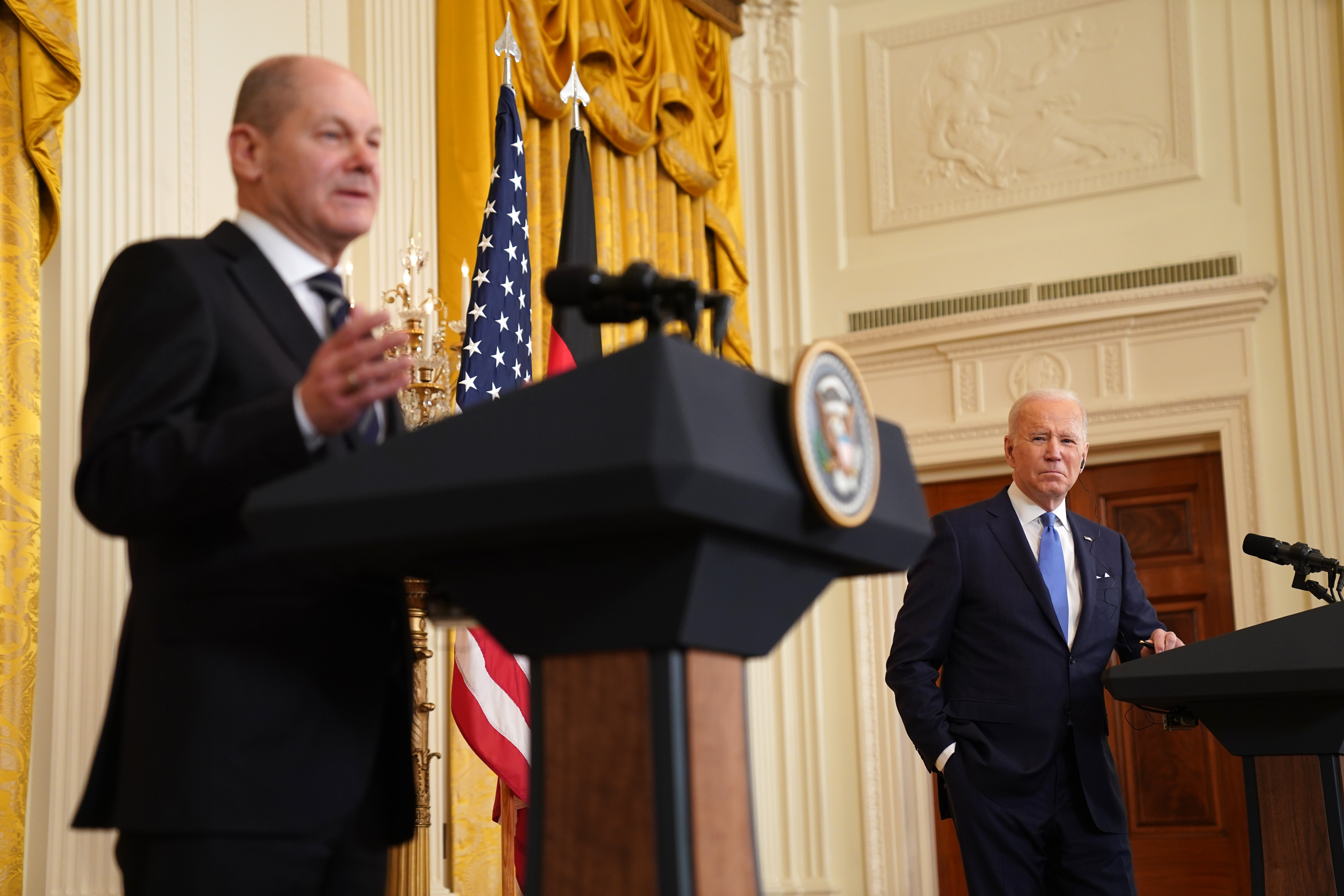 U.S. President Joe Biden, right, during a news conference with Olaf Scholz, Germany's chancellor, in the East Room of the White House in Washington, D.C., U.S., on Monday, Feb. 7 2022. Biden met with Scholz to discuss the situation with Ukraine amid questions over Germany's resolve to stand firm against Russia. Photographer: Leigh Vogel/UPI/Bloomberg via Getty Images
