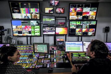 Television directors at RT in Moscow. AFP