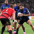 Angus Ta'avao carries the ball into the heart of the Crusaders' pack during the Blues' loss in Christchurch.