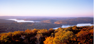 Western Maryland is known for its heavily forested mountains. A panoramic view of Deep Creek Lake and the surrounding Appalachian Mountains in Garrett County.