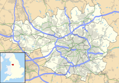 Mapa konturowa Wielkiego Manchesteru, blisko centrum po prawej na dole znajduje się punkt z opisem „Uniwersytet Manchesterski”