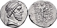 Two sides of a coin. The side on the left showing the head of a bearded man, while the right a standing individual.