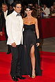 Italian actors Gabriel Garko in a suit and Laura Torrisi in a gown, considered Red carpet fashion by designer dress code (2009)