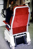 Wheelchair fitted with Mecanum wheels, taken at an Trade fair in the early 1980s