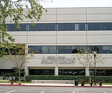 A grey nondescript building with the text "Activision" on the first floor.