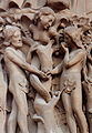 Adam, Eva i la serp representada com una dona a la Catedral de Notre Dame, Paris