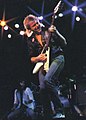 German guitarist Michael Schenker performing on his signature brilliant white Flying V in 1981