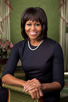Official portrait of Michelle Obama in the Green Room of the White House