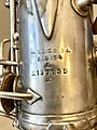 A Conn New Wonder Series 2 alto saxophone (dated 1927). The 'H' below the serial number indicates that it is a "High Pitch" (A=456 Hertz) instrument. A "Low Pitch" saxophone would have 'L' below the serial number.