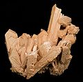 Tan thénardite pseudomorphing mirabilite crystals from the Boron, California area. Cluster is 6 × 5.5 cm.