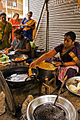 A woman making bajjis in Mylapore