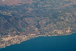 Benicàssim and Desert de les Palmes mountains from the air, 2011.