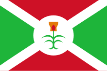 flag white saltire cross on green and red background with plant in centre white rondel
