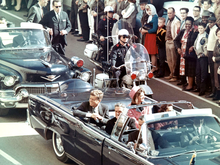 President John F. Kennedy, his wife Jacqueline, Texas governor John Connally, and Connally's wife Nellie in the presidential limousine minutes before the assassination in Dallas