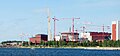 Image 73Olkiluoto 3 under construction in 2009. It was the first EPR, a modernized PWR design, to start construction. (from Nuclear power)