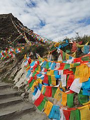 prayer flags on the path to Yumbulagang