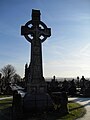 Celtic Cross at the entrance of the cemetery dedicated to the first priests buried there