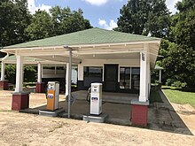 The reconstructed Ben Roy Service Station that stood next to the grocery store where Till encountered Bryant in Money, Mississippi,[244] 2019