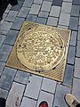 Painted gold Manhole cover in Tel Aviv, Israel