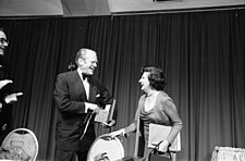 President Gerald Ford (left) with White House Correspondent Helen Thomas at the 1975 Dinner.