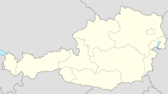 Mapa konturowa Austrii, blisko prawej krawiędzi nieco na dole znajduje się punkt z opisem „Schachendorf”