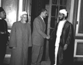 Talib Alhinai (right) and Egypt's President Gamal Abdel Nasser (left) shaking hands in Cairo