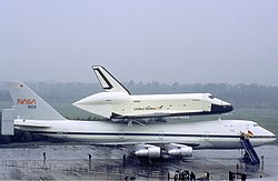 Space Shuttle Enterprise attached to Shuttle Carrier Aircraft for ferry flight