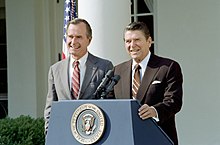 Ronald Reagan and George H. W. Bush speaking to the press at the White House Rose Garden in 1982