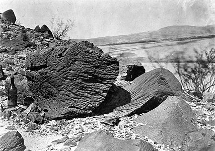 Rock carved by drifting sand below Fortification Rock in Arizona, 1871.