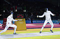 Russian Igor Turchin (left) and American Weston Kelsey (right) duel in second round of men's individual épée
