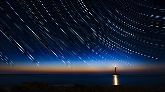 Star trails with sunset at La Hague lighthouse