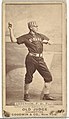 Standing man in baseball uniform throwing ball