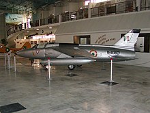 Grey fighter plane in a museum