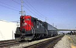 West (railroad north) of Santa Clara, a Southern Pacific EMD SD9 leads a two-car train before the Caltrain takeover