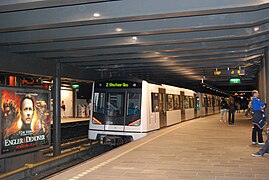A Metro train leaving Nationaltheatret Station