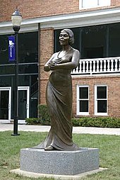 This eight foot bronze sculpture was erected on November 9, 2006, in front of Twichell Auditorium on the campus of Converse College in Spartanburg, South Carolina. Designed by New York-based artist Meredith Bergmann and commissioned by the college; the sculpture is housed permanently on the campus.